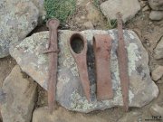 Archeologists found ancient daggers and axes